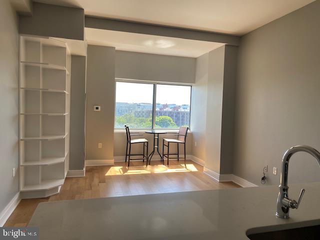 interior space featuring light hardwood / wood-style flooring and sink