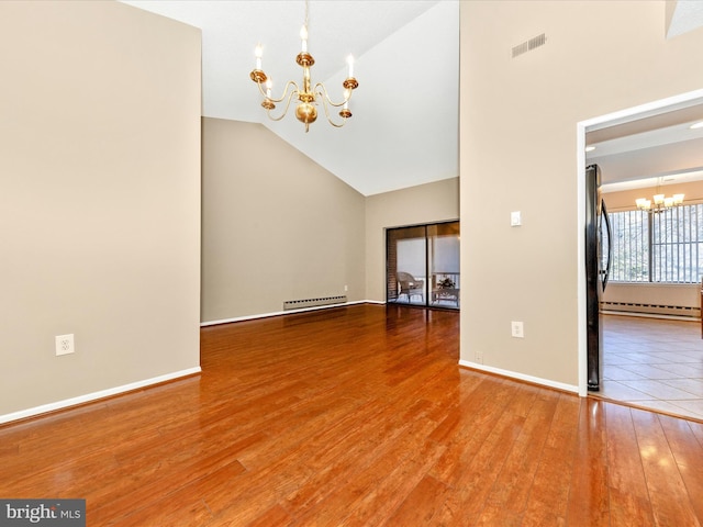 unfurnished room with a chandelier, wood-type flooring, high vaulted ceiling, and baseboard heating