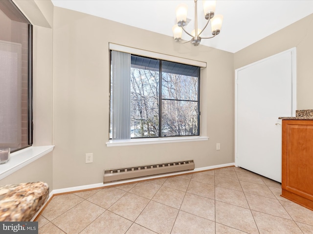 unfurnished dining area with light tile patterned flooring, a notable chandelier, and a baseboard heating unit