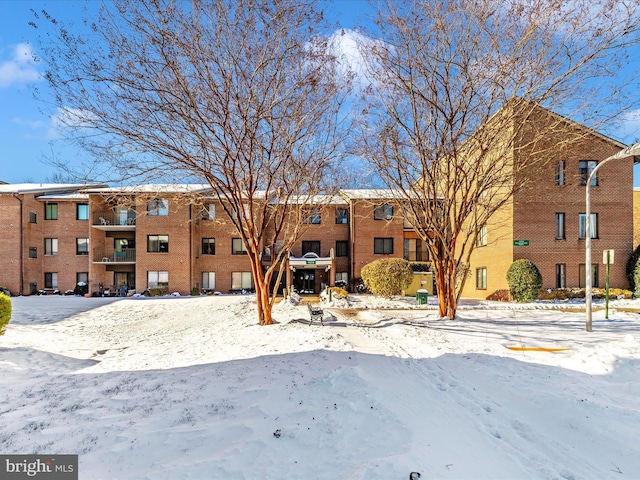 view of snow covered building