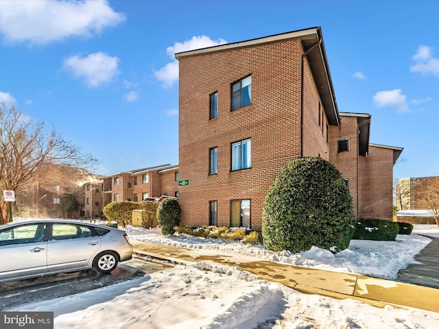 view of snow covered building