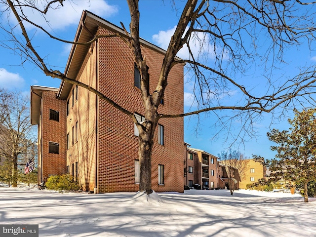 view of snow covered property