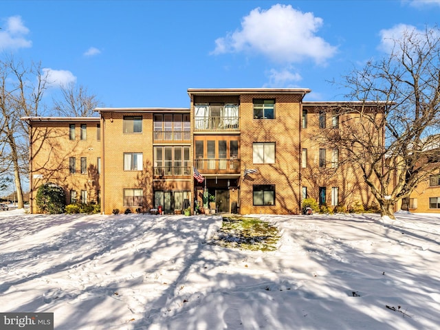 view of snow covered property