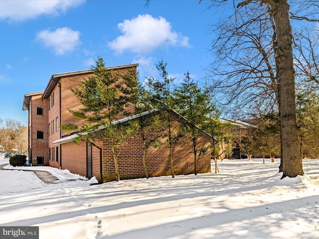 view of snow covered property