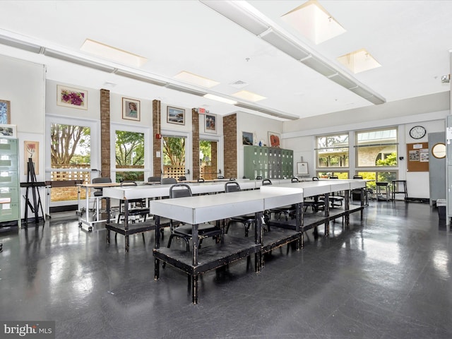 dining space featuring a skylight