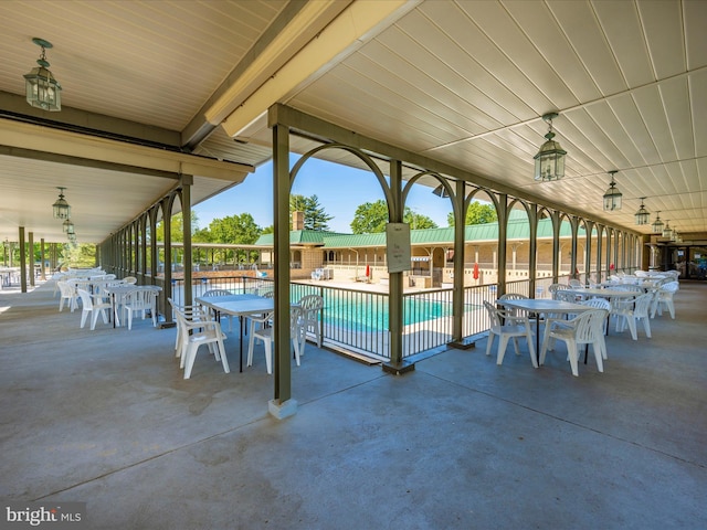 view of swimming pool with a patio area