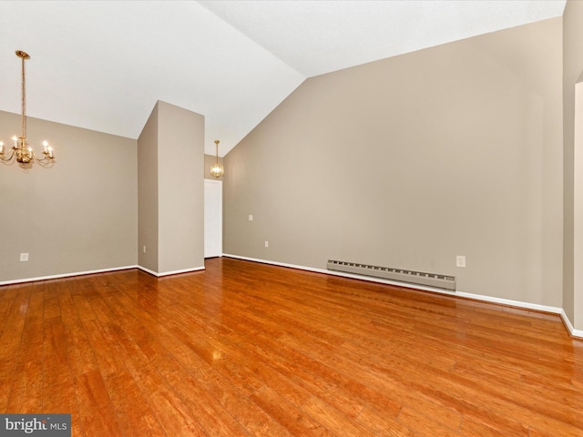 unfurnished living room with a chandelier, wood-type flooring, lofted ceiling, and a baseboard radiator