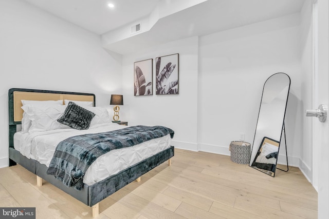 bedroom featuring hardwood / wood-style flooring