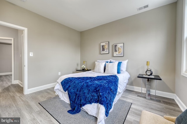 bedroom featuring hardwood / wood-style floors