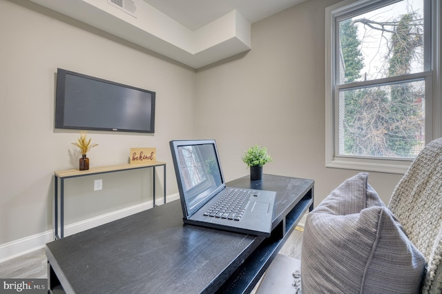 home office featuring hardwood / wood-style floors