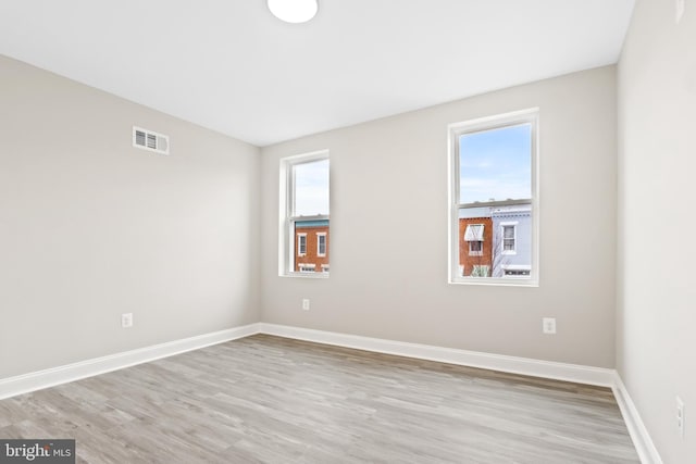 empty room featuring light wood-type flooring