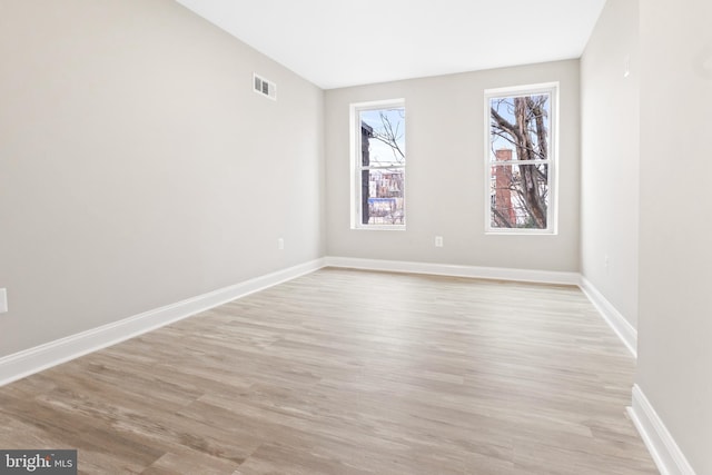 empty room featuring light hardwood / wood-style floors