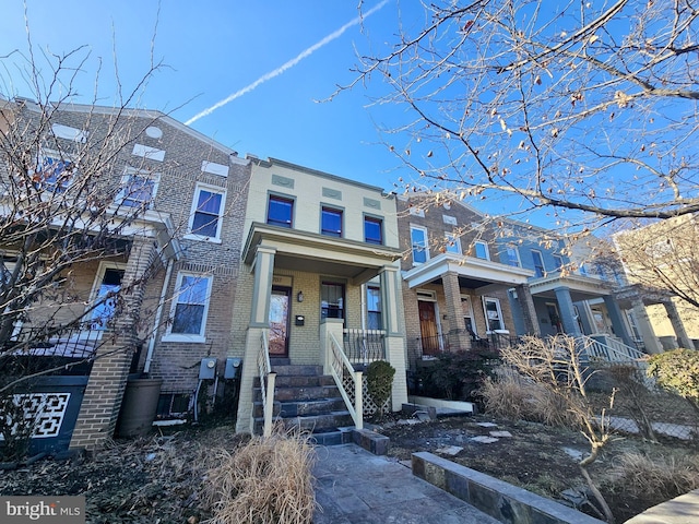 view of property with covered porch