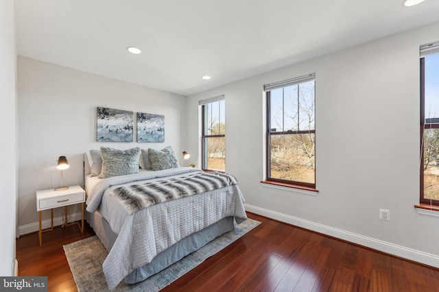 bedroom featuring dark hardwood / wood-style flooring