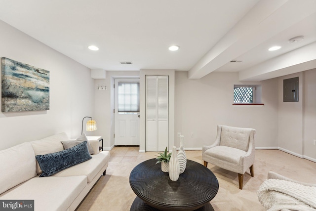 living room featuring light colored carpet and electric panel