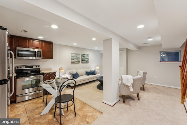 living room featuring light carpet