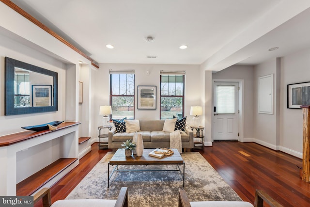 living room featuring dark hardwood / wood-style flooring