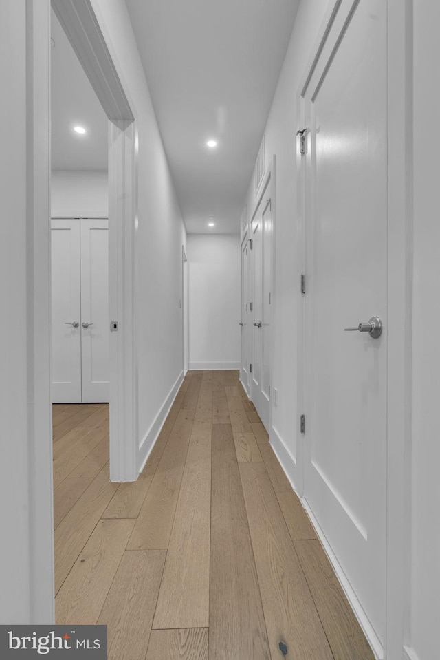 hall featuring light hardwood / wood-style flooring