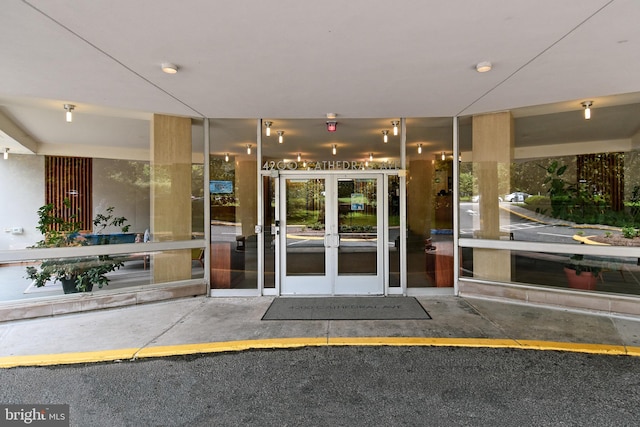 view of exterior entry featuring french doors