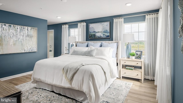 bedroom featuring light wood-type flooring