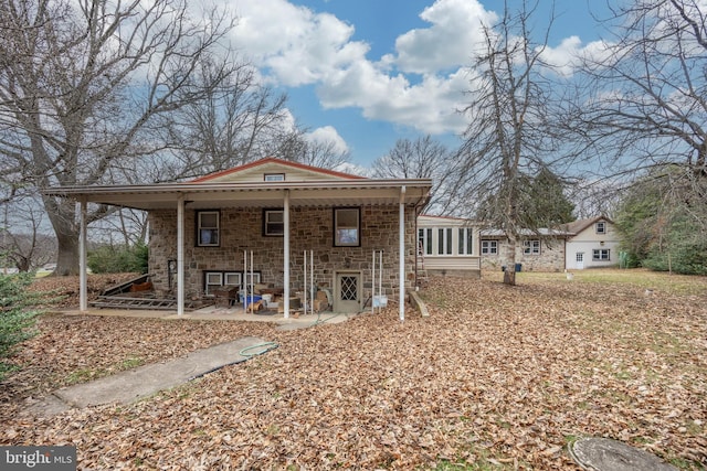 back of house featuring a patio