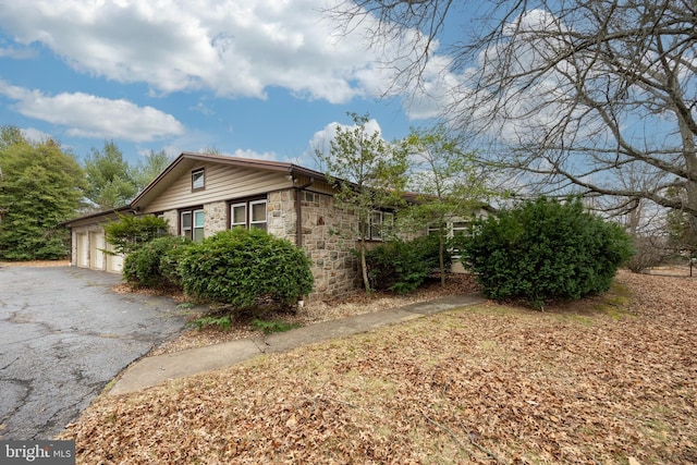 view of home's exterior featuring a garage