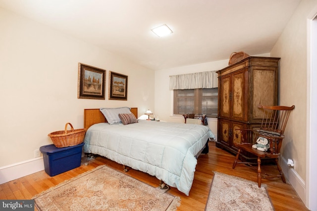 bedroom with light wood-type flooring