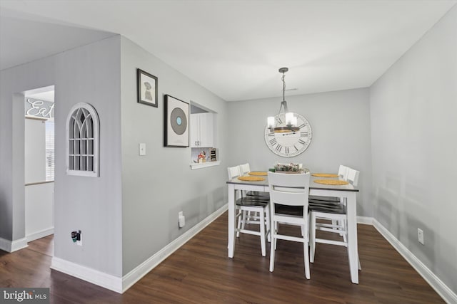 dining room featuring dark hardwood / wood-style flooring