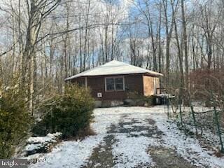 view of snow covered property