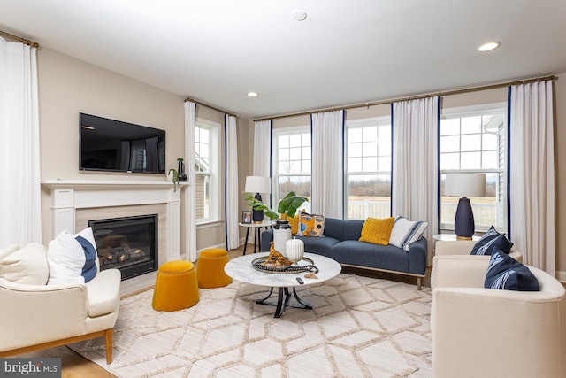 TBB Westmoreland Way Clemson Ii, Charles Town, WV 25414 - living area with healthy amount of natural light, wood finished floors, a premium fireplace, and recessed lighting