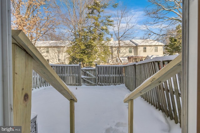 view of snow covered deck