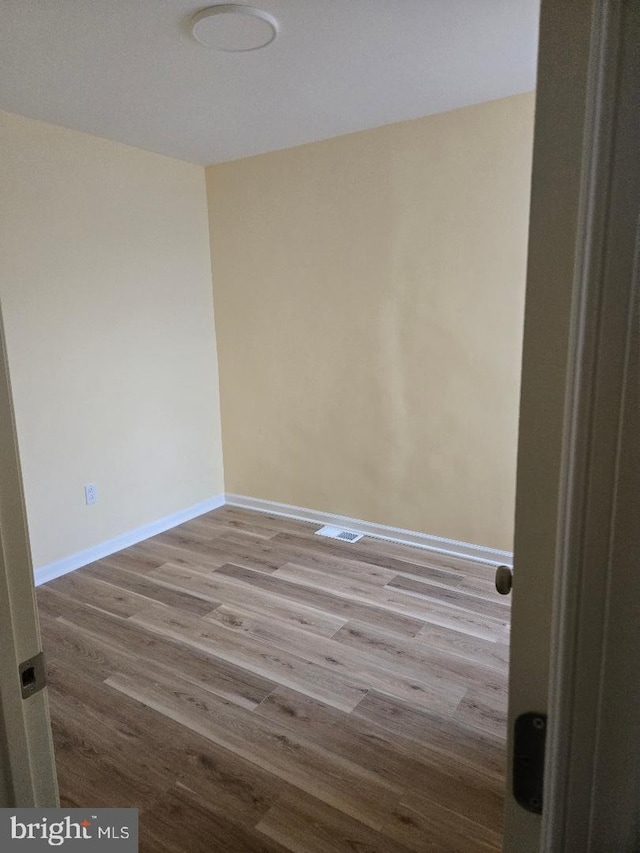 empty room featuring light hardwood / wood-style flooring