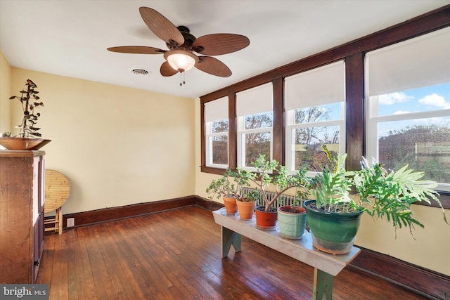 sunroom / solarium with ceiling fan