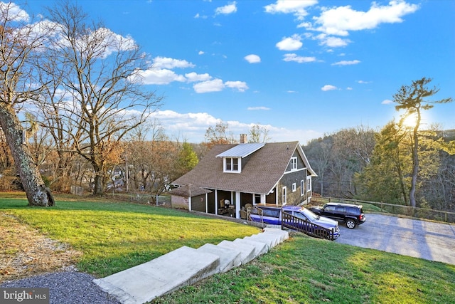 view of front of property with a front yard