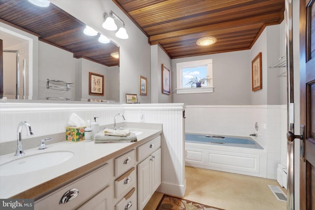 bathroom featuring a bath, vanity, and wooden ceiling