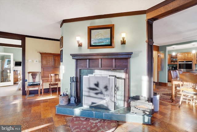 interior space featuring parquet flooring, oven, and ornamental molding