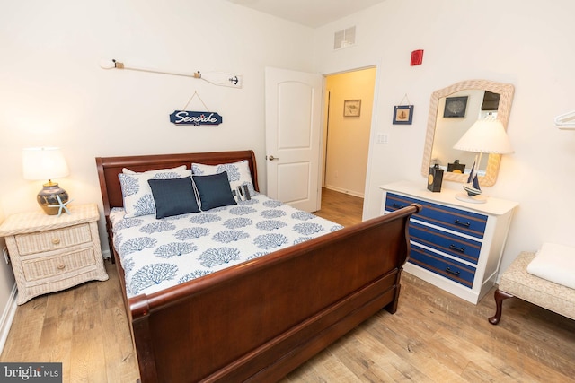 bedroom featuring hardwood / wood-style floors