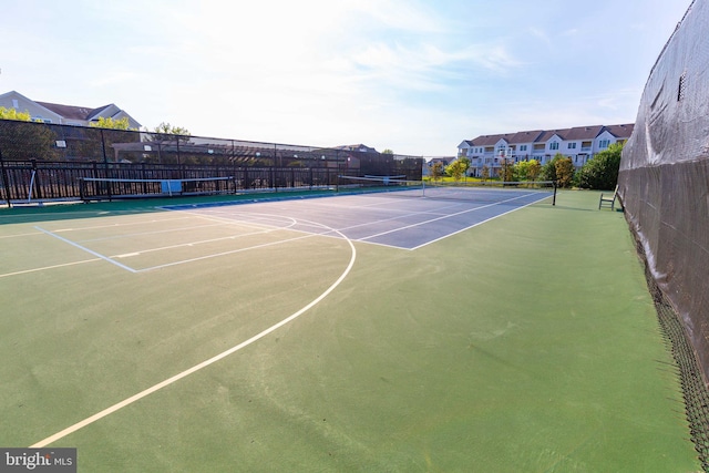 view of tennis court with basketball court