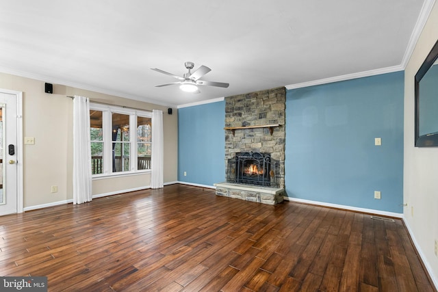 unfurnished living room with hardwood / wood-style flooring, a fireplace, ceiling fan, and crown molding