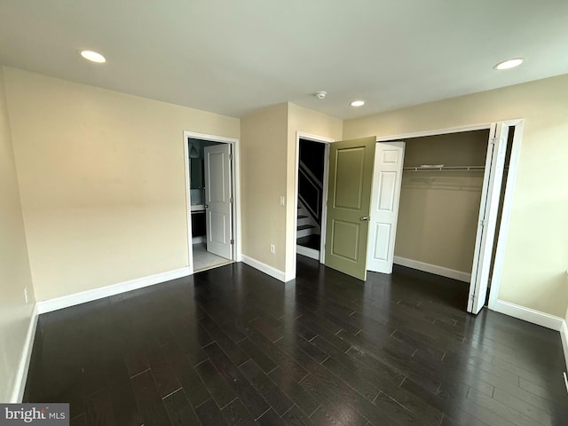 unfurnished bedroom with a closet