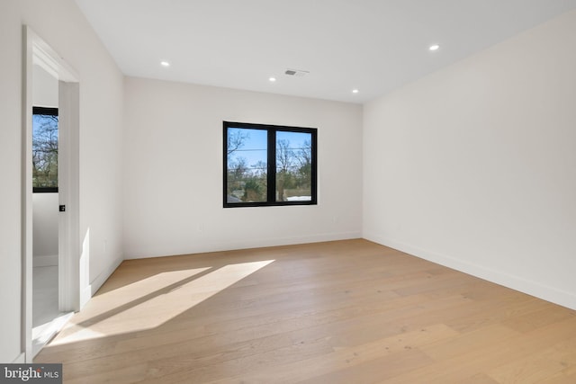 empty room featuring light hardwood / wood-style floors