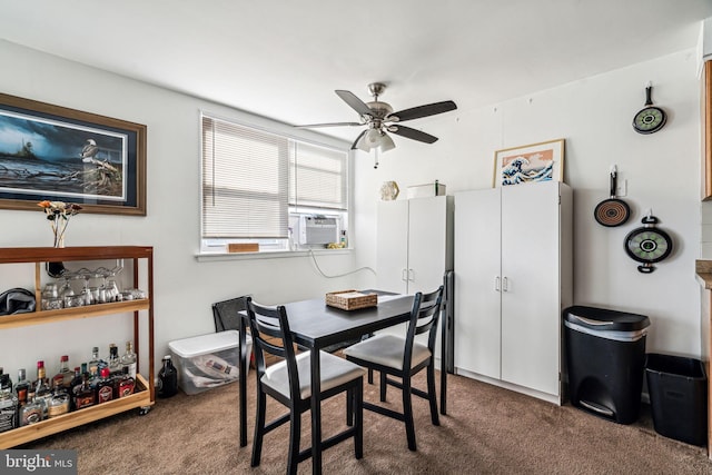 carpeted dining space featuring ceiling fan and cooling unit