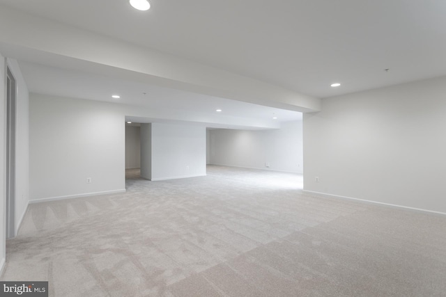 basement with light carpet