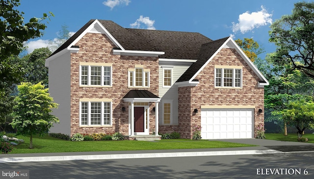 view of front of home featuring a front yard and a garage