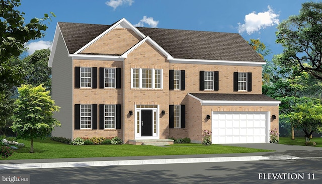 colonial inspired home featuring a front yard and a garage