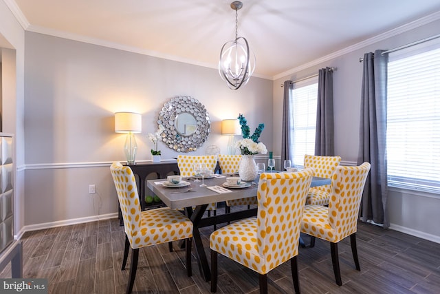 dining room featuring crown molding and a chandelier