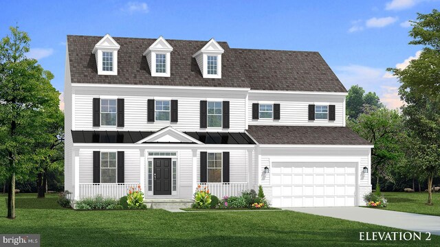 view of front of home featuring a front lawn, a porch, and a garage