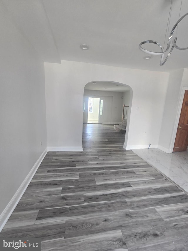 unfurnished dining area featuring hardwood / wood-style flooring