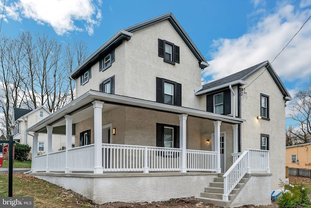 view of front facade featuring covered porch