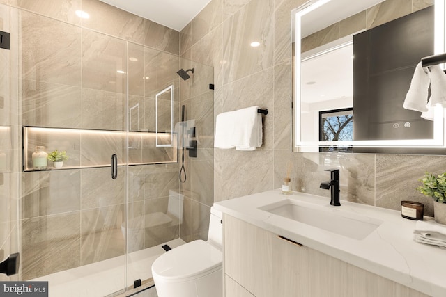 bathroom with decorative backsplash, toilet, vanity, and walk in shower